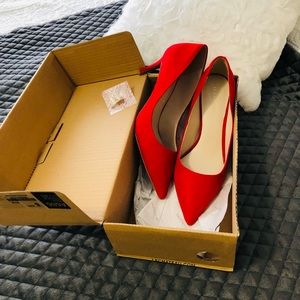 Red pumps/heels. new in condition